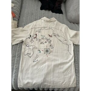 TravelSmith brand shirt featuring an embroidered map of the Pacific Ocean